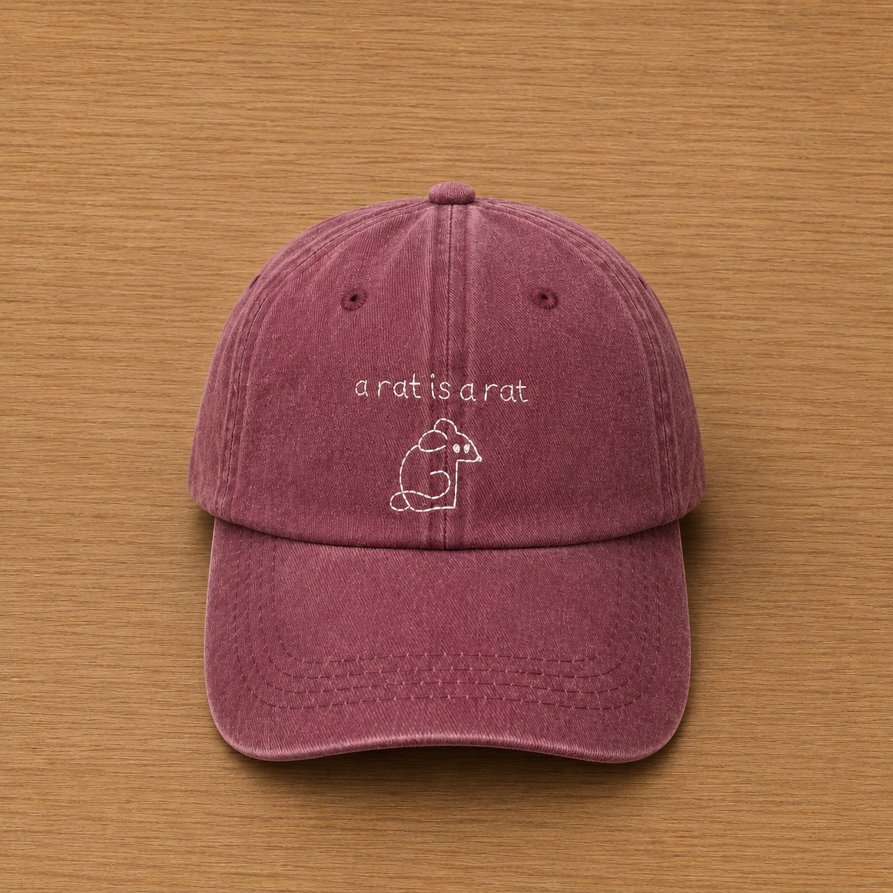 Casquette bordeaux avec "a rat is a rat" brodé à la main