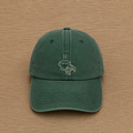 Forest green cap with hand-embroidered coffee and croissant