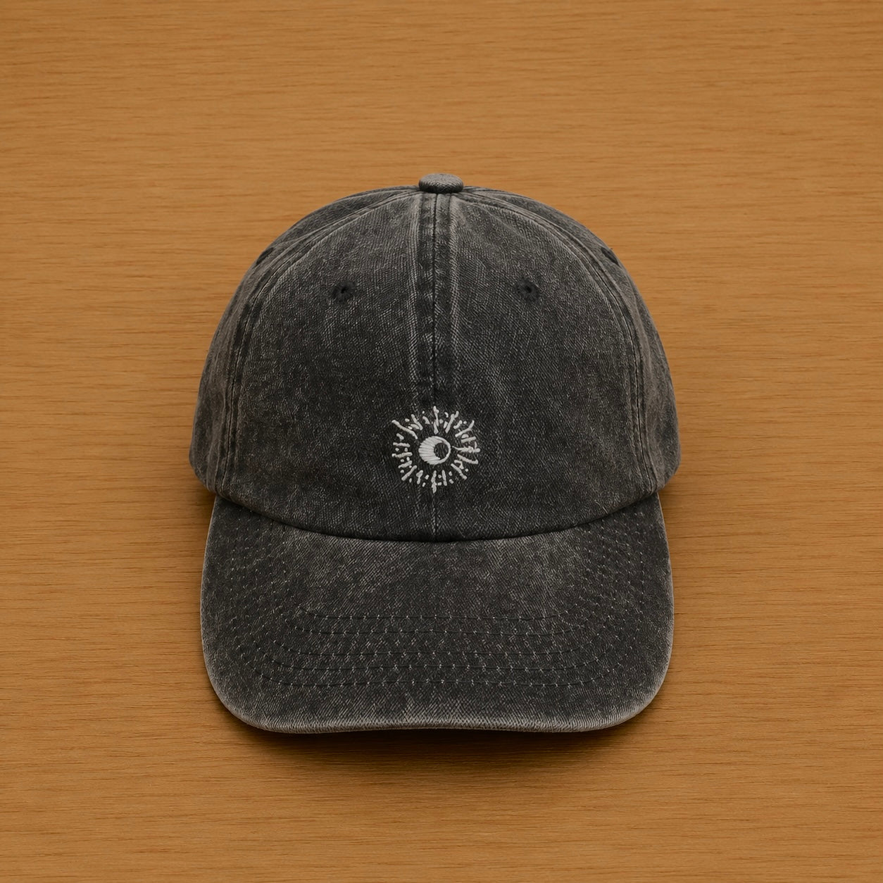 Dark gray cap with hand-embroidered sun