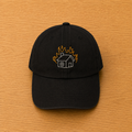 Gorra color negro con casa en llamas bordado a mano