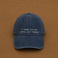 Dark blue cap with "I think I'm not going out tonight" hand-embroidered