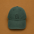 Gorra color verde bosque con dinosaurio bordado a mano